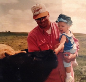 Dean with daughter, Lauren on their ranch. 